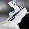 Pantalones Deportivos de Rayas Pierna Recta para Hombre y Mujer Primavera y Otoño Ropa Urbana Americana Pantalones Cleanfit Sueltos Pierna Ancha Casual Largos