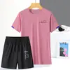 Conjunto Esportivo de Seda Gelada de Verão Secagem Rápida Respirável Camiseta Gola Redonda Conjunto Curto Tendência Feminina Conjunto de Duas Peças para Corrida e Montanhismo Absorvente de Suor