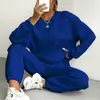 Conjunto de Duas Peças Outono e Inverno 2025 Novo Europeu e Americano Roupas Femininas Top de Gola Redonda com Mangas Longas e Padrão Trançado e Calça Leggings 9918
