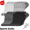 Fabricante de Zhuji Venta al por mayor y Dropshipping Calcetines Deportivos y Casuales de Color Sólido Nuevos para Primavera y Otoño para Hombres y Mujeres