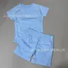 Traje Esportivo de Manga Curta Transfronteiriço Camiseta de Alta Elasticidade que Absorve o Suor para Mulheres Top de Malha Sem Costura para Fitness Manga Curta para Mulheres