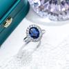 Moda Transfronteriza Anillo Ajustable Europeo y Americano de Zirconia y Piedras Preciosas de Colores con un Toque de Lujo, Elegancia y Alta Gama Presentando Zafiros Rojos y Azules y Diamantes Rosas