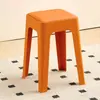 Taburete de piernas cruzadas cojín suave para el hogar taburete grueso resistente macarrón simple almacenamiento taburete alto taburete de comedor taburete cuadrado fabricante