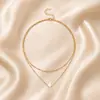 Collar con colgante de estrella de cinco puntas con concha caliente de moda transfronteriza europea y americana, collar de cadena de cuentas de estrella de doble capa para mujer