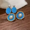 Brincos de Pérola Azul Turquesa com Borda de Metal de Alto Padrão Estilo Hong Kong para Mulheres, Design de Nicho da Moda de Luxo Leve, Brincos Geométricos