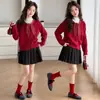Conjunto de cárdigan de punto con lazo de lunares rojos para niña Otoño Invierno Nuevo Estilo Coreano Estilo Académico Suéter Falda plisada Dos Piezas
