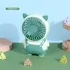 Nuevo ventilador de mano de dibujos animados portátil para exteriores con carga ventilador pequeño para estudiantes niños ventilador eléctrico venta al por mayor de fábrica
