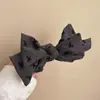 Pasador de Pelo con Lazo Grande de Doble Cara Color Gris Oscuro para Mujeres con Cabeza de Bola y Fijación para Cola de Caballo con un Clip en la Parte Posterior de la Cabeza