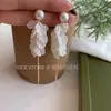 "White Mengyu" Pendientes de Borla con Pétalos para Mujer 2025 Nuevo Estilo Caliente Pendientes de Alta Gama Pendientes Únicos y Hermosos