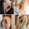 Suministro transfronterizo de pegatinas de tatuajes de flores coloridas impermeables resistentes al sudor estilo europeo y americano sexy cintura pecho brazo floración temporal simulación espina verde