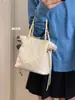 Moda Estilo Coreano Bolsa Acolchoada com Corrente Bolsa de Mão Feminina 2026 Nova Bolsa de Balde Simples Versátil Bolsa de Ombro Transversal