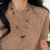 Collar de cadena de hueso de serpiente y ojo de tigre marrón Maillard de moda de Sugar Family, cadena larga de lana de nicho de alta calidad para mujer