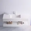 Gabinete de baño moderno minimalista integrado con losa de roca de doble capa con lavabo de cerámica sin juntas
