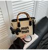 2025 Nueva Moda Bolso de Cubo Portátil Bolso de Hombro para Vacaciones de Playa para Mujer Bolso Cruzado Tejido Moderno que Combina con Todo