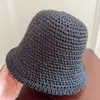 Sombreros al por mayor Sombrero de pescador tejido retro francés para mujer Verano Delgado Versátil Sombrero para el sol Estilo japonés Sombrero de pescador