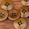 Maillard temporada nueva abrigo con botones de fruta cortavientos suéter suéter de combinación de colores accesorios de botones de suéter borde ancho de cuatro ojales