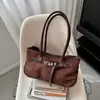 Bolso de hombro de diseño nicho estilo coreano para mujer, otoño temprano 2026, bolso de mano retro a la moda para el trabajo, bolso de axila de lujo ligero de alta gama