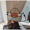 Mini Bolsa de Palha Tecida de Verão para Mulheres 2026 Novo Estilo Bolsa de Ombro Único Transversal Bolsa Pequena para Férias na Praia Bolsa de Balde