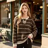 Nuevo suéter de punto a rayas de otoño europeo y americano para mujer, estilo casual versátil holgado, diseño de cuello redondo, top de manga larga