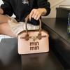 Popular Bolso Concha Portátil Transfronterizo para Mujer 2025 Nuevo Color Contrastante Nicho Versátil Bolso de Hombro Bolso Cruzado de Alta Gama