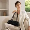 2026 Nova Bolsa de Couro de Vaca Couro Genuíno Bolsa de Ombro Moda Europeia e Americana Bolsa Baguete Design de Nicho Bolsa de Mão Bolsa Feminina
