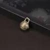 Campana de cabeza de tigre, exquisita joyería DIY, colgante retro de tamaño pequeño, campana de latón, campana de cobre con apertura de una palabra, venta al por mayor