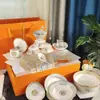 Juego de vajilla retro transfronterizo para el hogar de 26 piezas de alta calidad, caballo dorado tirado por caballos, porcelana ósea, juego de platos y cuencos, sensación de alta calidad