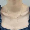 Nuevo Collar con Colgante de Corazón Dorado Estilo Ins Diseño de Nicho Dulce Simple Cadena para Clavícula con Borla de Cristal para Mujer
