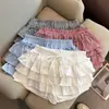 Tiro real: Saia bolo anti-exposição de renda franzida doce estilo Dongdaemun para mulheres 2026, minissaia de cintura baixa para baixinhas