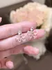 Aretes para Mujer Aretes Transparentes de Flor para Mujer Moda Temperamento Versátiles Diseño de Nicho Aretes Largos de Temperamento