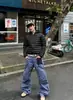 Calça cargo vintage de estilo de rua americano com bolsos cruzados, calça de jardineiro de perna larga e curva para homens, calça comprida versátil de corte solto
