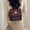 Mochila nicho fresco caricatura 2026 mochila para ir al trabajo nuevo estilo femenina lindo estilo pequeño versión coreana escolar estampado de leopardo moda
