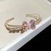 Pulseira Aberta de Zircônia Dupla Camada Borboleta Vazada Estilo Francês de Luxo Leve Exquisite Nicho Joia de Mão de Alto Padrão para Mulheres