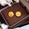Pendientes circulares de tejido cruzado versátiles europeos y americanos, acero inoxidable chapado en oro de 18 quilates, de moda, lujo ligero, pendientes personalizados al por mayor