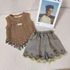 Conjunto Estilo Bohemio para Niñas Modelo Nuevo 2026: Conjunto de Tres Piezas para Vacaciones de Niña Grande: Chaleco, Camisola y Shorts de Mezclilla