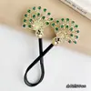 Pinza de pavo real retro de alta gama para mujer, herramienta para moño alto de flor en la parte posterior de la cabeza, clip de torsión para moño perezoso, accesorio para el cabello