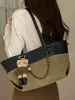 Yue Zi 2026 Outono/Inverno Nova Bolsa Tote Grande Capacidade Versátil de Mão/Ombro Moda Estilo Férias Simples Bolsa para o Dia a Dia