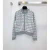 Cárdigan de punto casual y versátil para mujer, con diseño de rombos y bloques de color, modelo nuevo otoño 2026, con cuello alto, mangas largas y efecto adelgazante