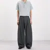 Ropa de hombre Xintang Diseño retro a rayas curvas pliegue único informal para ir al trabajo estilo alta inteligencia pantalones casuales holgados