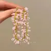 Aretes de Vacaciones Adecuados para el Verano 2025 Nuevos Aretes Populares para Mujeres Coloridos Exagerados con Cuentas Flor Borla