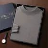 Otoño e Invierno Nuevo Jersey de Cachemir de Cuello Medio para Hombre Tejido Holgado Versátil Casual de Negocios Camiseta Interior de Punto