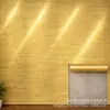 Adesivos de parede autoadesivos IXPE transfronteiriços, adesivos de parede de fundo decorativos em rolo, grão fino horizontal de cor dourada, alto brilho, atacado