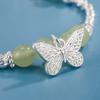 Pulseira de borboleta de jade Hetian prata quebrada design nicho retrô nova garota chinesa imitação de jade alto senso presente de aniversário