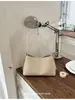 Versátil bolsa tejida retro para mujer, nuevo modelo de verano 2026, adecuada para el trabajo y los desplazamientos, bolso de mano casual, bolso de hombro, bolso de axila