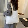 A popular bolsa de grande capacidade deste ano 2021 outono e inverno nova bolsa de ombro feminino moda portátil tote saco casual