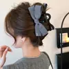 Pinza de sujeción de mezclilla con lazo de estilo coreano de moda para mujer 2025 Nuevo sentido de la moda Pinza para el pelo Pinza de tiburón para la parte posterior de la cabeza