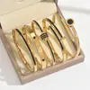 Mayoristas Transfronterizos Europeos y Americanos Fabricantes de Broches Joyería Fina para Mujer, Pulsera de Acero de Titanio Color Dorado que No se Desvanece