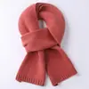 Bufanda de lana para niñas coreana de color liso bufanda pequeña otoño e invierno tejida bufanda para niños mayores Joker fábrica al por mayor