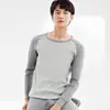 Conjunto térmico de algodón puro para hombre, cuello redondo, con bloques de color, corte ajustado, capa base, adecuado para hombres jóvenes y de mediana edad para usar como camiseta interior y pantalón largo en otoño