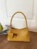 Bolso de axila tejido a mano de estilo coreano de nicho transfronterizo para mujer, bolso de mano casual de moda, bolso de cubo de hombro de gran capacidad